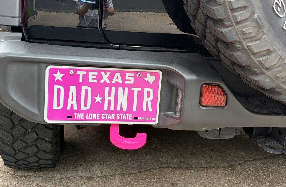 Close-up of the pink DAD HNTR plate